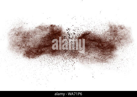 Brown dust cloud.Brown particles splattered on white background. Stock Photo