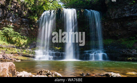 A beautiful flowing waterfall in the Brecon Beacons national park, Wales (Sgwd yr Eira / Fall of the snow) Stock Photo
