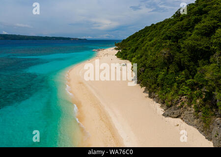 Aerial drone view of the beautiful sandy, tropical beach of Pukka Shell on Boracay Island, Philippines Stock Photo