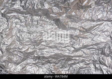 Cellophane, Film, Plastic wrap isolated on white Background. Crumpled polyethylene texture Stock Photo