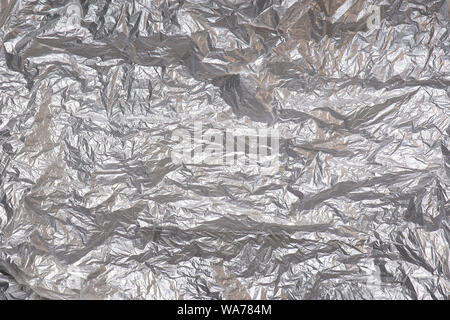 Cellophane, Film, Plastic wrap isolated on white Background. Crumpled polyethylene texture