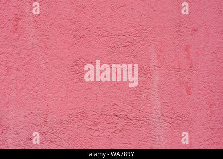 red color painted plastered wall background texture Stock Photo