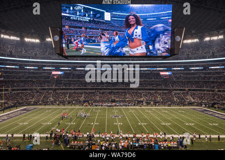 AT&T Stadium, home of the Dallas Cowboys National Football League team in  Arlington, Texas. The stadium is famous for its enormous video board, seen  above, here depicting the Dallas Cowboys' Cheerleaders in