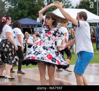 Brentwood Essex 18th August 2019 Essex Custom Culture Show, A CLASSIC CAR SHOW AND VINTAGE FAIR     A MID SUMMER CELEBRATION OF MID 20TH CENTURY CULTURE held at the Brentwood Center Brentwood Essex Dancing led by the Brentwood Strollers Credit Ian Davidson/Alamy Live News Stock Photo