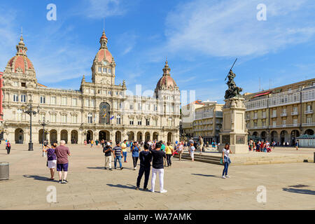 A La Coruna, Spain. The ornate building town hall Palacio Municipal and Maria Pita memorial statue in Maria Pita square. A La coruna. Spain Stock Photo