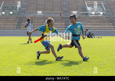 Kamaishi, Japan. 18 August 2019.  Elementary-school children from Taiwan, Australia and Japan take part during the ''Kamaishi Kids Try'' sports event at Kamaishi Unosumai Memorial Stadium. The ''Tohoku Media Tour: Iwate Course'' is organized by the Tokyo Metropolitan Government in collaboration with local authorities to showcase the recovery efforts in Tohoku area affected by the 2011 Great East Japan Earthquake and Tsunami.  The Credit: ZUMA Press, Inc./Alamy Live News Stock Photo