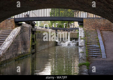 STOKE BRUERNE, NORTHAMPTONSHIRE, UK - MAY 10, 2019:  Lock gates in action holding back water on the Grand Union Canal Stock Photo