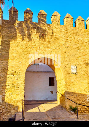 Arch of the Closed Door, Arco de la Puerta Cerrada, in the Jewish quarter of Vejer de la Frontera downtown. Cadiz province, Andalusia, Spain. Stock Photo