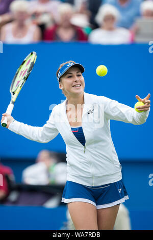 Belinda Bencic of Switzerland hitting tennis ball into crowd after beating Madison keys of USA. Aegon International 2015 - Eastbourne - England, Tuesd Stock Photo