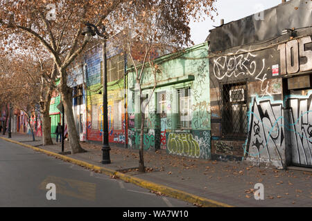 Street scene with multiple murals in Bellavista, Santiago, Chile Stock Photo