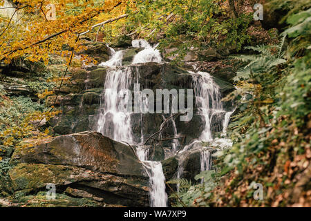 Waterfall Shypit in the autumn forest in Carpathian mountains, Ukraine Stock Photo