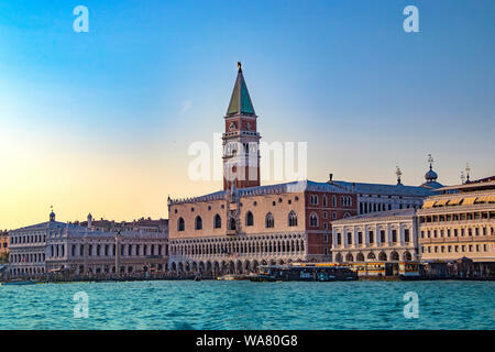 The magnificent view of Venice at sunset in Italy. There are blue sky and clear water. Stock Photo