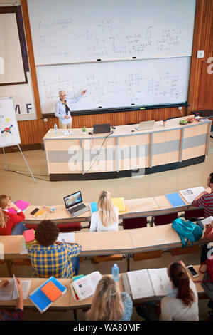 students in class learning - professor in training class with students Stock Photo