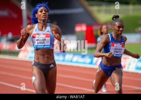 Shaunae Miller-Uibo of The Bahamas wins the women's 200 metres, with Dina Asher-Smith of Great Britain coming second, during the Birmingham 2019 Müller Grand Prix, at the Alexander Stadium, Birmingham, England. Stock Photo