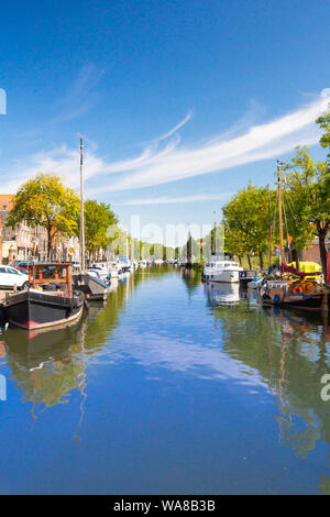 EDAM, NETHERLANDS - SEPTEMBER 1, 2018:  View of Edam, Netherlands as seen from the canal with boats in view Stock Photo