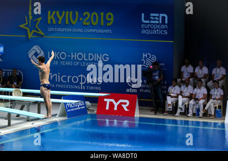 KYIV, UKRAINE - AUGUST 7, 2019: Patrick HAUSDING of Germany preparing to dive during Mens 1m Springboard Final of the 2019 European Diving Championship in Kyiv, Ukraine Stock Photo