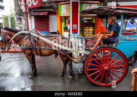 A Traditional Horse and Carriage (Calesa), Chinatown, Manila, The Philippines Stock Photo