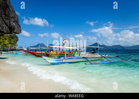 Traditional Wooden Banca Boats At Entalula Beach, El Nido, Palawan, The Philippines Stock Photo