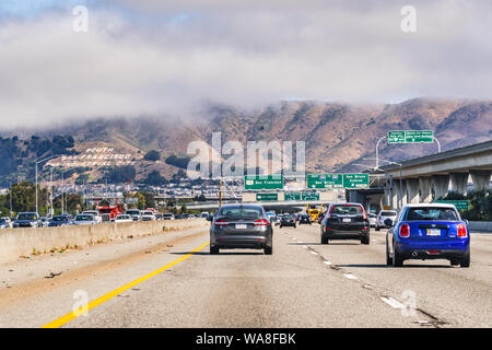 August 10, 2019 South San Francisco / CA / USA - Travelling on the freeway and approaching an interchange in San Francisco bay area; South San Francis Stock Photo