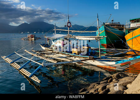Traditional Wooden Banca Boats In The Harbour At Puerto Princessa, Palawan Island, The Philippines Stock Photo