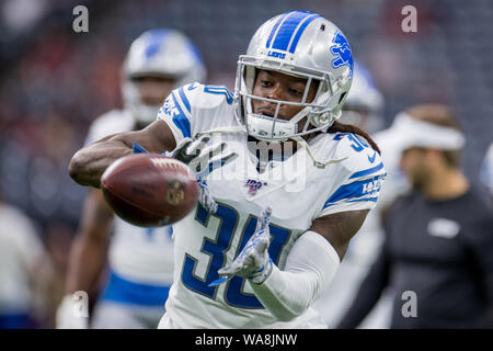 Detroit Lions defensive back Dee Virgin (30) steps on the line for