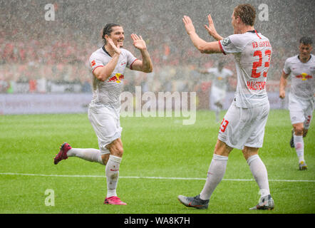 (190819) -- BERLIN, Aug. 19, 2019 (Xinhua) -- Marcel Sabitzer (L) of Leipzig celebrates his scoring with Marcel Halstenberg during a German Bundesliga match between 1.FC Union Berlin and RB Leipzig in Berlin, capital of Germany, on Aug. 18, 2019. Leipzig won 4-0. (Photo by Kevin Voigt/Xinhua) Stock Photo