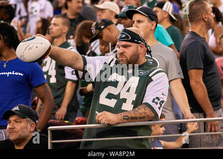 New York Jets fan reacts in the fourth quarter in week 12 game of