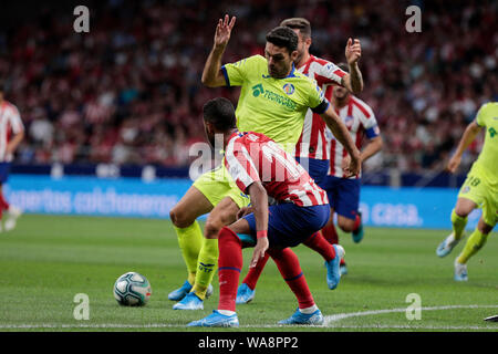 Atletico de Madrid's Renan Lodi and Getafe CF's Jorge Molina are seen in action during the La Liga football match between Atletico de Madrid and Getafe CF at Wanda Metropolitano Stadium in Madrid.(Final score; Atletico de Madrid 1:0 Getafe CF) Stock Photo