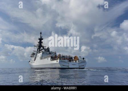 Crewmembers aboard Coast Guard Cutter Kimball (WMSL 756) test the fire monitors mounted above the flight deck during the ship’s final sea trials Aug. 17, 2019. Kimball, the seventh National Security Cutter built for the Coast Guard, is scheduled for a unique dual-commissioning ceremony with Coast Guard Cutter Midgett (WMSL 757), the eighth NSC, at both cutters’ new homeport in Honolulu Aug. 24, 2019. U.S. Coast Guard photo by Chief Petty Officer John Masson. Stock Photo