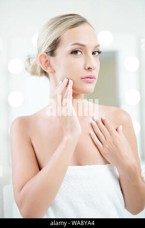 portrait of blond woman taking a shower Stock Photo - Alamy