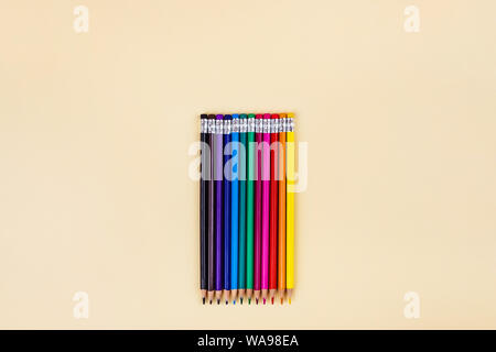 Back to school creative template with colored pencils. Stock Photo