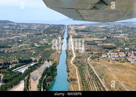 Aerial view from a light plane of the Corinth Canal, which links the gulf of Corinth with the Saronic Gulf, Peloponnese. Greece. Stock Photo