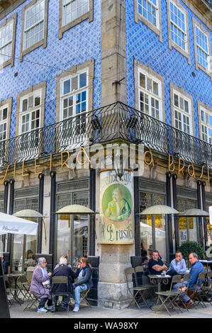 The Cafe Brasileira, a trditional old cafe decorated with azulejo tiles. in the center of Braga in North west Portugal. Stock Photo