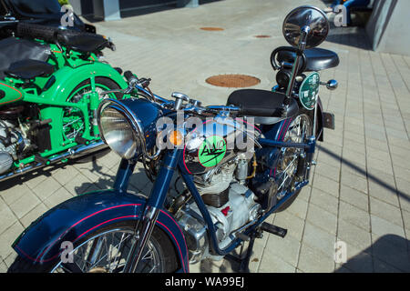 City Riga, Latvian republic. Retro car party. Oldtimer cars, motorcyle at the motor museum. Urban city view. 17 August 2019. Stock Photo