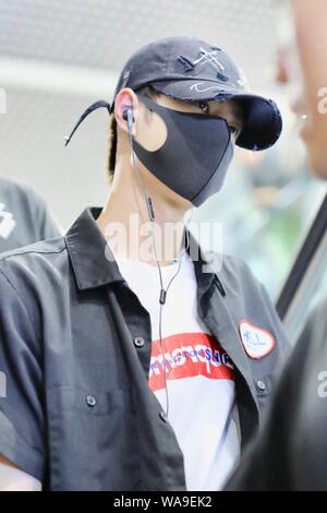 Chinese actor and singer Wang Yibo of South Korean-Chinese boy band UNIQ arrives at an airport in Shanghai, China, 29 July 2019. Stock Photo