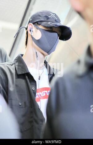 Chinese actor and singer Wang Yibo of South Korean-Chinese boy band UNIQ arrives at an airport in Shanghai, China, 29 July 2019. Stock Photo