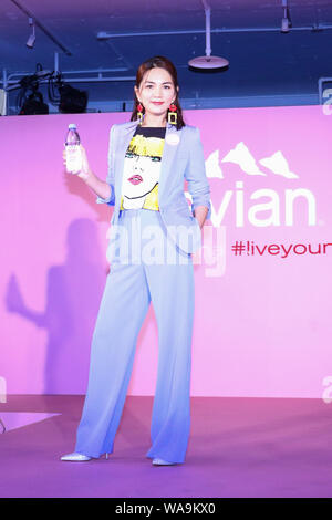 **TAIWAN OUT**Taiwanese singer Ella, or known as Chen Chia-hwa, attends a press conference of Evian, a French brand of mineral water, promoted Evian v Stock Photo