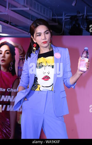 **TAIWAN OUT**Taiwanese singer Ella, or known as Chen Chia-hwa, attends a press conference of Evian, a French brand of mineral water, promoted Evian v Stock Photo