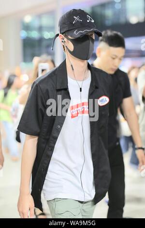 Chinese actor and singer Wang Yibo of South Korean-Chinese boy band UNIQ arrives at an airport in Shanghai, China, 29 July 2019. Stock Photo