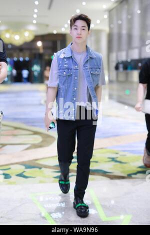 Canadian singer and actor Henry Lau arrives at the an airport after landing in Shanghai, China, 9 July 2019. Stock Photo