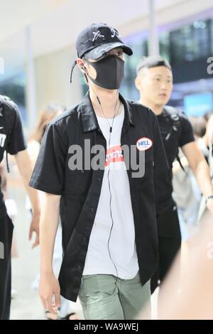 Chinese actor and singer Wang Yibo of South Korean-Chinese boy band UNIQ arrives at an airport in Shanghai, China, 29 July 2019. Stock Photo