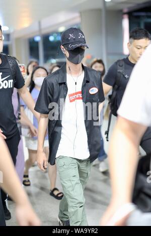 Chinese actor and singer Wang Yibo of South Korean-Chinese boy band UNIQ arrives at an airport in Shanghai, China, 29 July 2019. Stock Photo