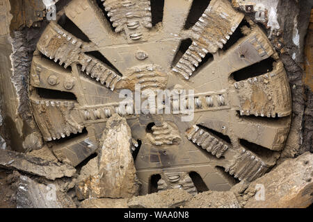 Tunnel Boring Machine front head element is seen on a subway station under construction. Stock Photo