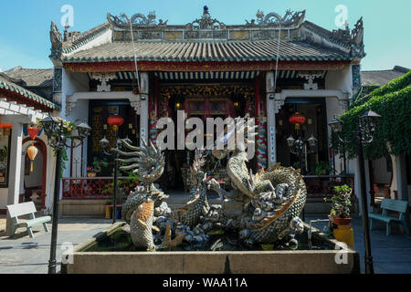 Hoi An, Vietnam - August 17: Dragon fountain at the Cantonese Assembly Hall (Quang Trieu) on August 17, 2018 in Hoi An, Vietnam.