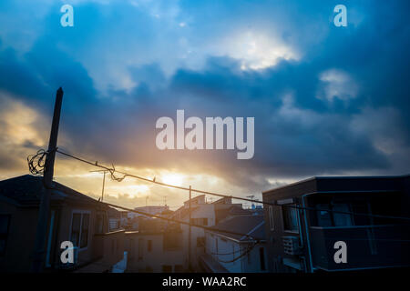 Sunray in the morning after thunder clouds break. Typhoon season. Summer. Stock Photo