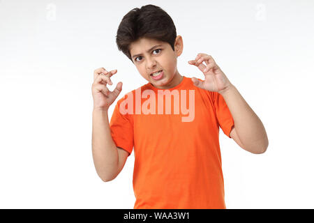 Portrait of a boy looking angry Stock Photo