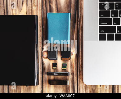 external hardisk, sd card and ssd card on table Stock Photo