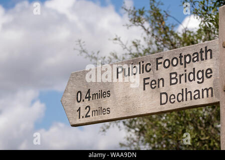 Footpath sign in Dedham Vale area of outstanding natural beauty made famous by painter John Constable on the Essex Suffolk border. Stock Photo