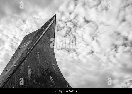 A black and white photo on a cloudy day of the intriguingly designed Catholic Church of St Joan of Arc in Rouen, France Stock Photo