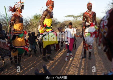 Samburu dancers attending a wedding ceremony in a village near Archers Post, Kenya. Stock Photo